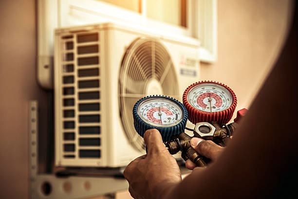 Professional Hvac technician working in Hebron, IL